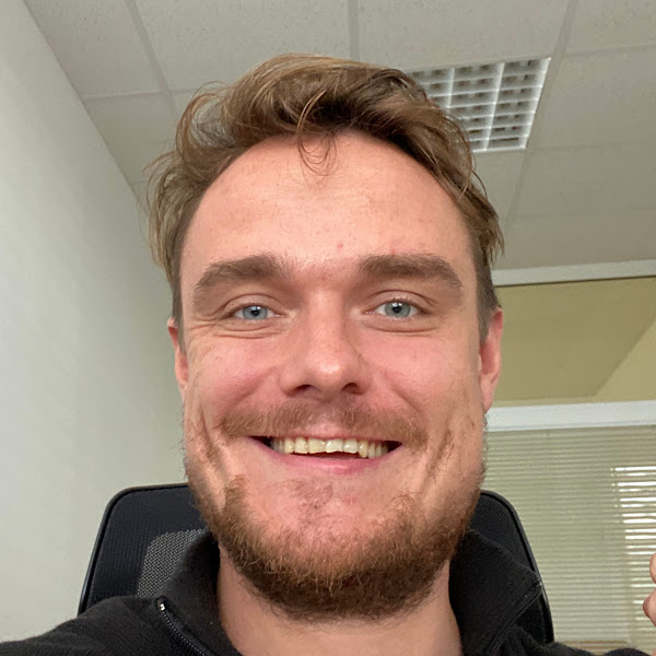 Gasper smiling at the camera